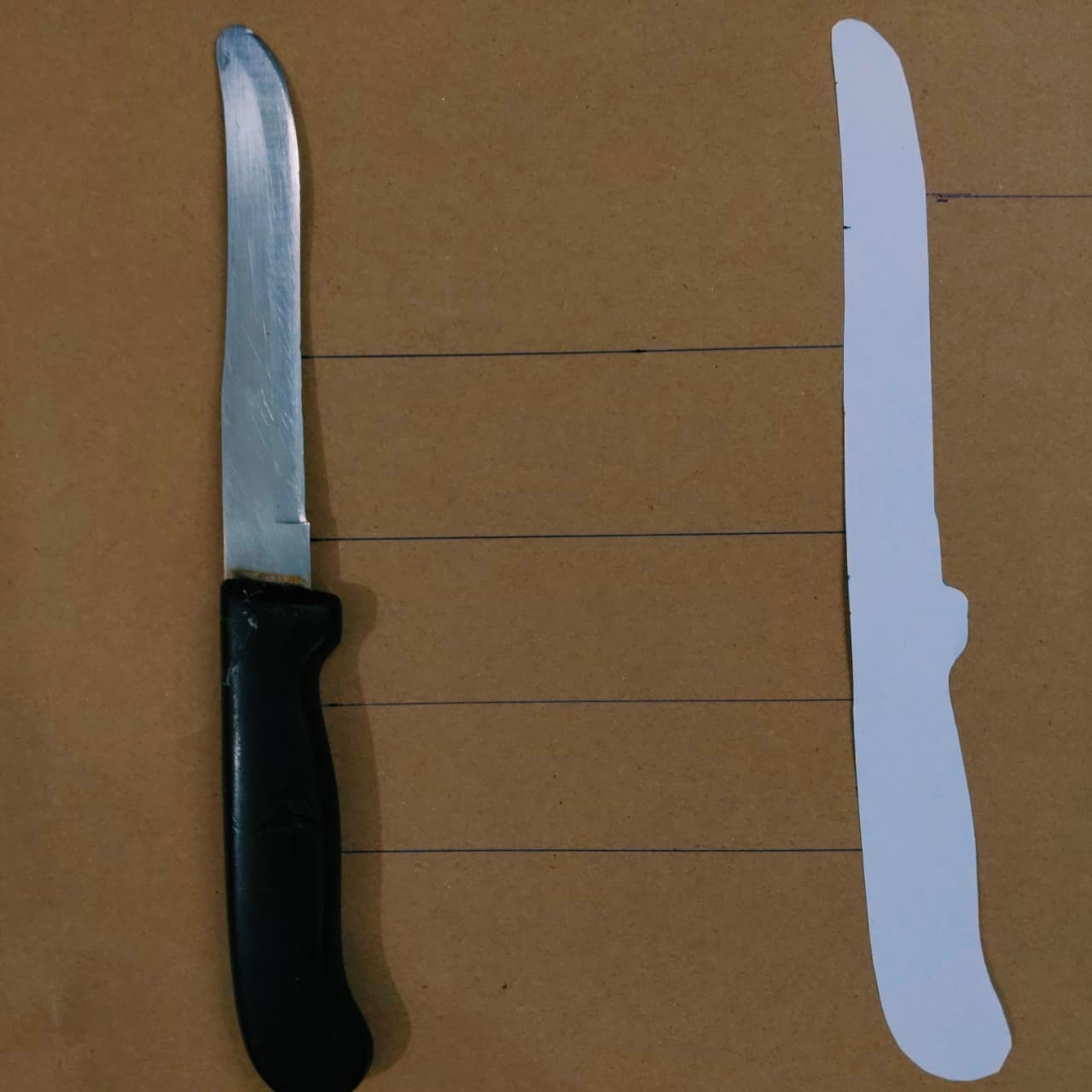 Real knife and paper cutout alignment example